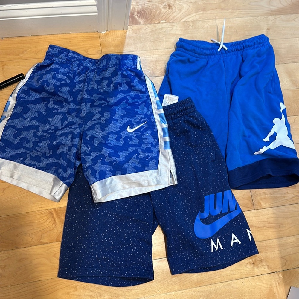 Bundle of 3 pairs Nike/Jordan Big boys blue shorts. Size M (10-12)